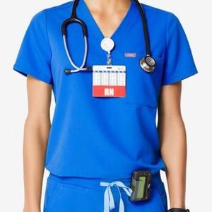 ISO figs royal blue one pocket top (size small)